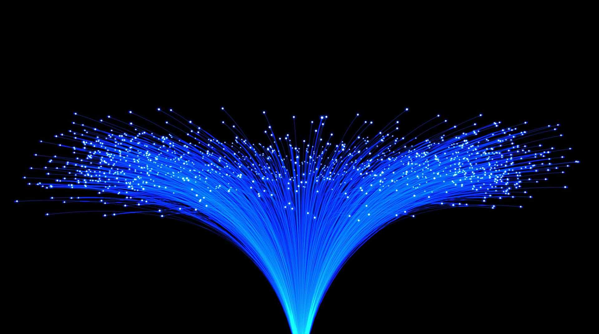 closeup of blue fiber optics with a black background