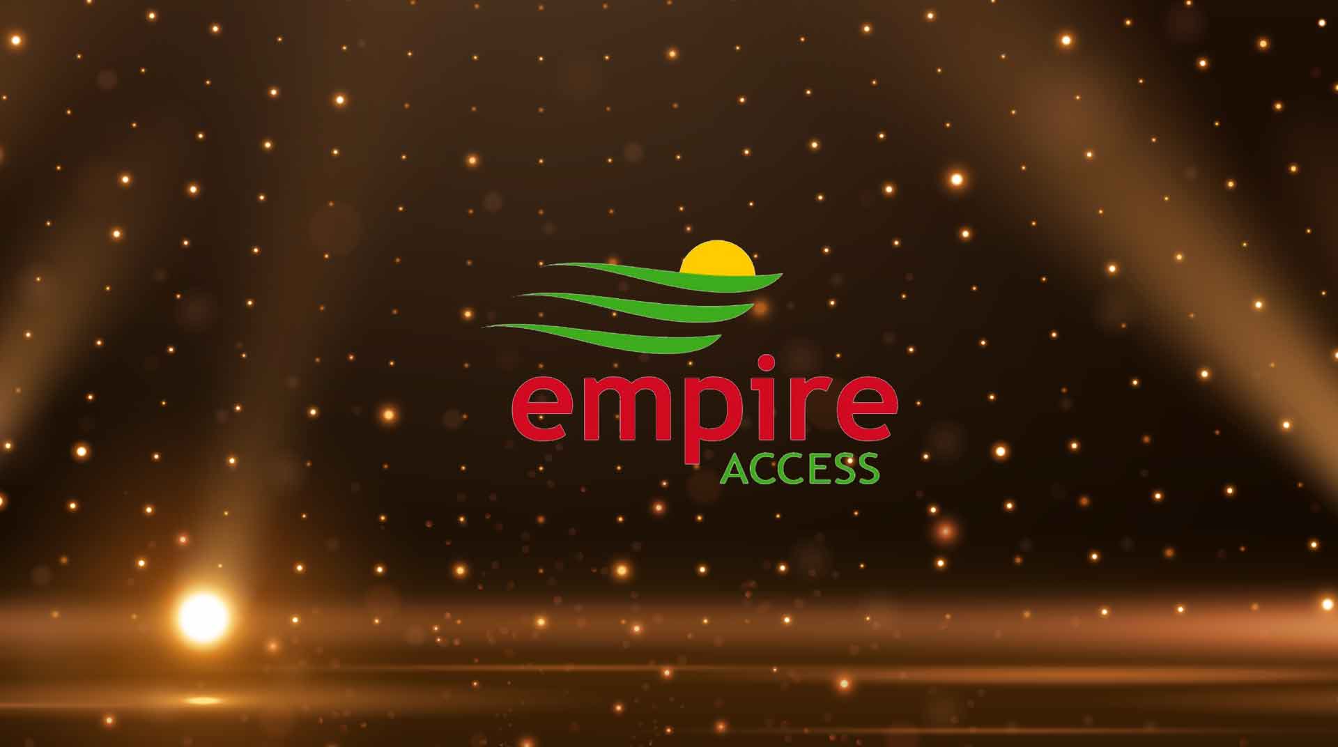 spotlight aimed at a stage with the Empire Access logo as the focus