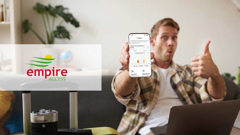 Man giving a thumbs up showing his phone with the Empire Access ProtectIQ app